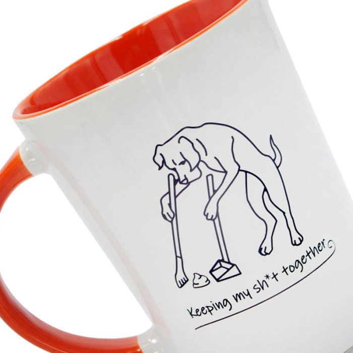 Keeping My Sh#t Together Coffee Mug with a cartoon dog using a pooper scooper